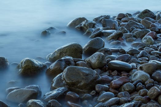 Time exposure of stones in the Westfjords coast, Iceland