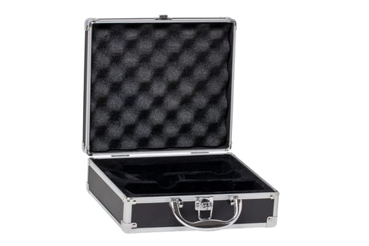 Closeup of a opened empty small black silver equipment case or suitcase with a latch isolated on a white background. Clipping path.