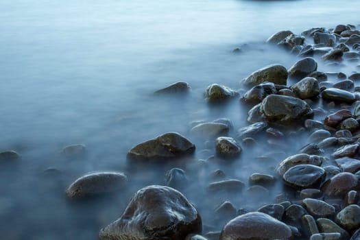 Time exposure of stones in the Westfjords coast, Iceland