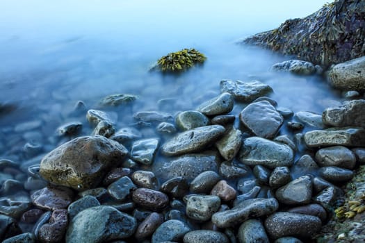 Time exposure of stones in the Westfjords coast, Iceland