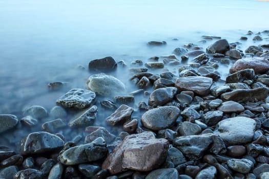 Time exposure of stones in the Westfjords coast, Iceland