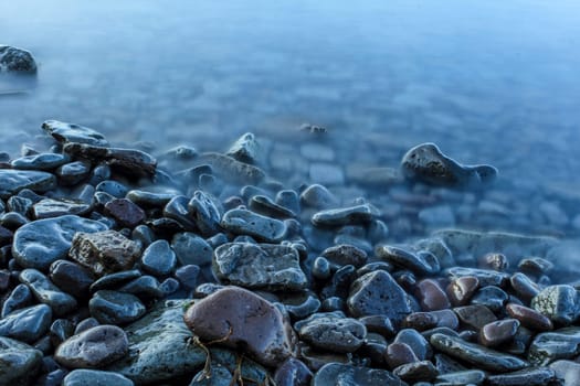 Time exposure of stones in the Westfjords coast, Iceland
