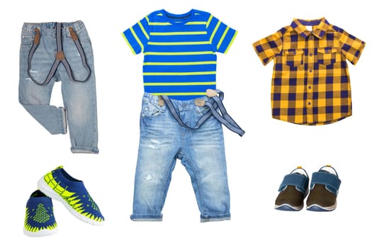 Collage set of boys spring autumn clothes isolated. Male kids apparel collection. Child boy fashion clothing outfit. Colorful stylish jeans, sweater, pants, shirts, shoes wearing.
