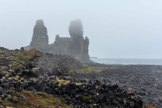 Stormy misty coast at Snaeffelsnes National Park, Iceland