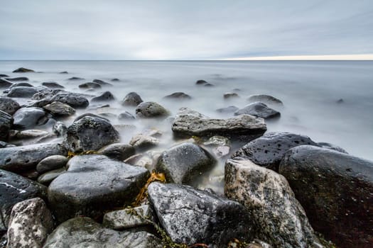 Time exposure of stones at the Westfjords coast, Iceland