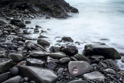 Time exposure of stony beach at Hellnar, Snaefellsnes National Park, Iceland