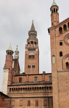 Cathedral of Cremona or Cathedral of Santa Maria Assunta and the Medieval Bell Tower of Cremona known as the Torrazzo, Lombardy, Italy.