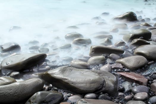 Time exposure of stones at the beach of Hellnar, Snaeffelsnes National Park