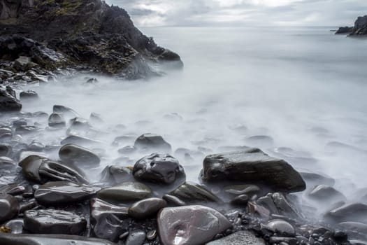 Time exposure of stony beach at Hellnar, Snaefellsnes National Park, Iceland