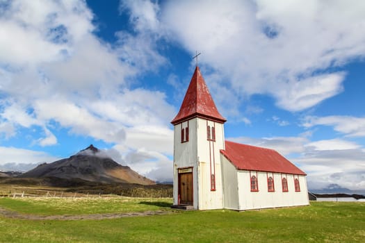 Church with red roof in Hellnar on a sunny summer day, Snaefellsnes peninsula
