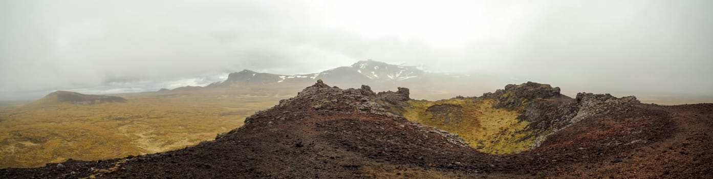 Panoramic view of volcanic crater landscape at Snaefellsnes National Park, cloudy weather