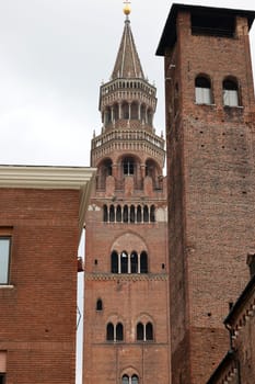 the Medieval Bell Tower of Cremona known as the Torrazzo, Lombardy, Italy.