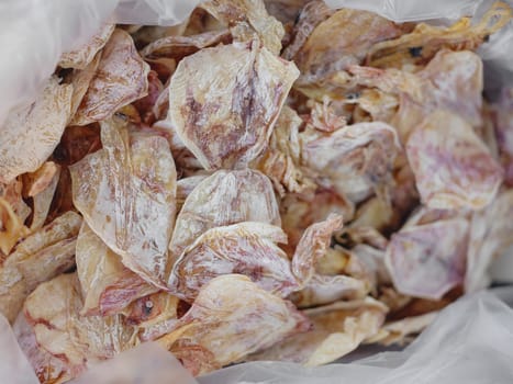 Asian food, dried squid at market .