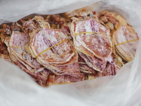 Dry dried squid on market at Rayong, Thailand