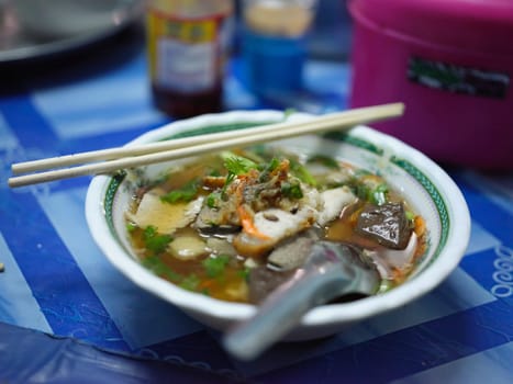 Thai street food ,  Name Tom Yum noodles with pork  .