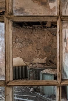 PHILADELPHIA, USA - AUGUST 15, 2022 - Derelict office and destructed ceiling in the Eastern State Penitentiary, USA