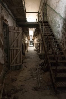 PHILADELPHIA, USA - AUGUST 15, 2022 - Abandoned corridor in the Eastern State Penitentiary in Philadelphia, USA