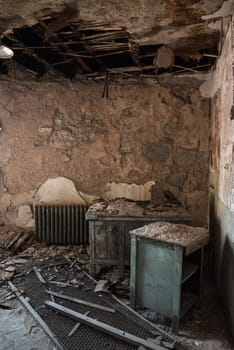 PHILADELPHIA, USA - AUGUST 15, 2022 - Derelict office and destructed ceiling in the Eastern State Penitentiary, USA