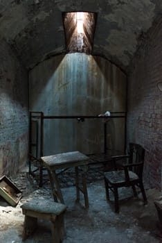 PHILADELPHIA, USA - AUGUST 15, 2022 - Old abandoned prison cell in Eastern State Penitentiary, USA
