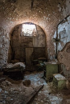 PHILADELPHIA, USA - AUGUST 15, 2022 - Old abandoned prison cell in Eastern State Penitentiary, USA