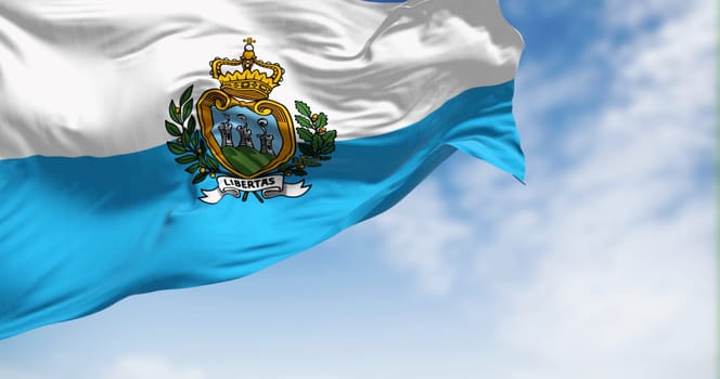 National flag of San Marino waving in the wind on a clear day. Republic of San Marino is a European microstate and country enclaved by Italy. 3d illustration render. Fluttering fabric