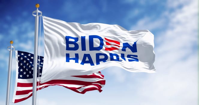 Washington D.C., US, June 20 2023: Biden Harris 2024 presidential election campaign flag waving with national US flag. Illustrative editorial 3d illustration render. 2024 US presidential election
