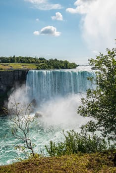 Famous Niagara Falls on a sunny day from the Canadian side