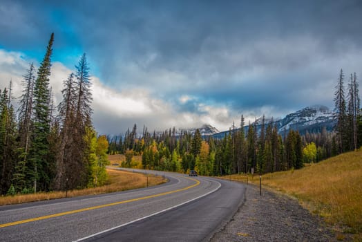 A highway in the Rocky Mountains in autumn, USA
