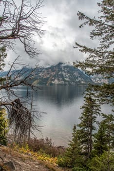Panoramic view of the Grand Teton mountain chain and a lake in Wyoming, USA