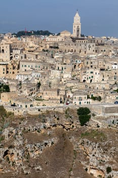Panoramic view of Sassi di Matera a historic district in the city of Matera, well-known for their ancient cave dwellings from the Belvedere di Murgia Timone,  Basilicata, Italy