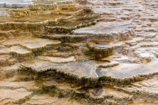 Scenic lifeless calcium terraces at Mammoth Hot Springs, Yellowstone National Park, USA