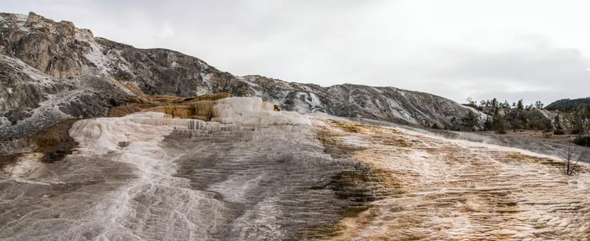 Scenic lifeless calcium terraces at Mammoth Hot Springs, Yellowstone National Park, USA