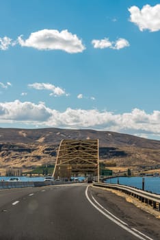 The huge Columbia river in Washington state, dry landscape surrounding the water, USA