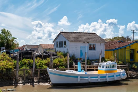 boat on a canal, Le Chateau-dOleron, Oleron, Charente-Maritime, France