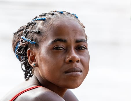 Andadoany, Bekopaka, Madagascar - November 4. 2022: Portrait of beautiful Malagasy woman in ferry on river Mania.