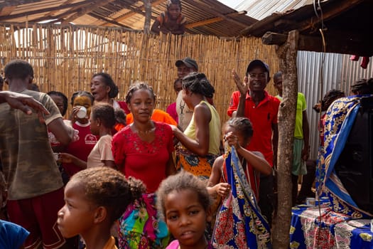 Bekopaka, Madagascar - November 6th 2022 - Women in colorful dresses dance at a rural village party in Bekopaka. The photo shows the festive mood and cultural diversity of the local people.