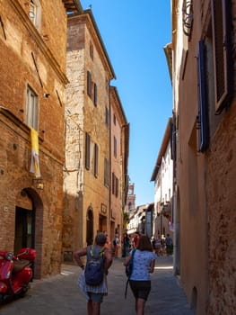 Pienza, Italy - Sept 12, 2022: Pienza, a tiny village in the Tuscany, known as the ideal city of the Renaissance and a capital of pecorino cheese. UNESCO World Heritage Site.