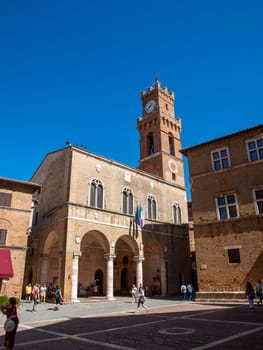 Pienza, Italy - Sept 12, 2022: Pienza, a tiny village in the Tuscany, known as the ideal city of the Renaissance and a capital of pecorino cheese. UNESCO World Heritage Site.