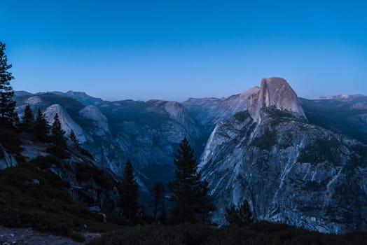 Scenic night sky above the famous Half Dome mountain, Yosemite NP, USA