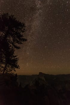 Scenic night sky above the famous Half Dome mountain, Yosemite NP, USA