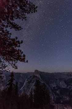 Scenic night sky above the famous Half Dome mountain, Yosemite NP, USA