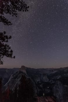 Scenic night sky above the famous Half Dome mountain, Yosemite NP, USA