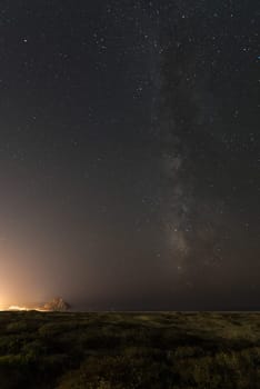 Starry night and the Milky Way above the Big Sur, US West Coast