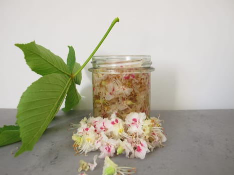 Chestnut flower extract, tincture from horse chestnut flowers in a jar