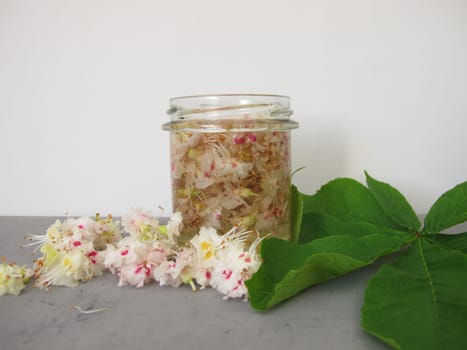 Chestnut flower extract, tincture from horse chestnut flowers in a jar