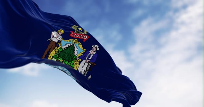 Maine state flag waving on a clear day. Coat of arms on a blue field with a moose, farmer, seaman and North Star. Motto: Dirigo. 3d illustration render. Rippled fabric. Selective focus.
