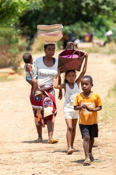 Miandrivazo, Madagascar - November 2nd, 2022: A group of Malagasy people on the streets of Miandrivazo.