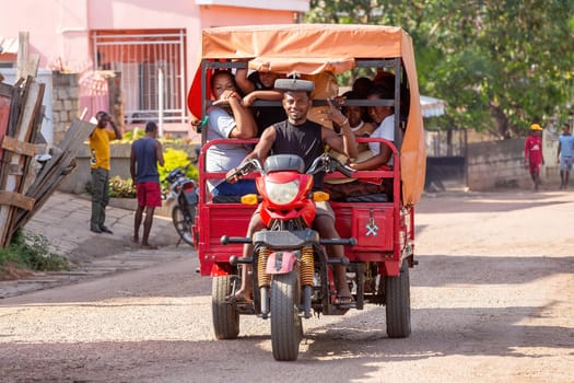 Miandrivazo, Madagascar - November 2nd 2022: Rarely seen motor rickshaw on the city streets, serving as a cultural emblem and a mode of transport.