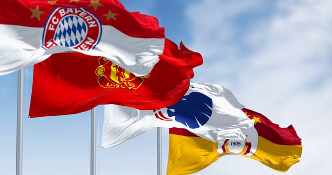Monaco, MC, August 31 2023: The flags of the Group A teams of the 2023-24 UEFA Champions League fluttering in the wind. Illustrative editorial 3d illustration render