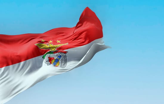 Lisbon, PT, sept. 2023: Benfica football club flag waving in the wind. Benfica is a Portuguese sports club based in Lisbon. Illustrative editorial 3D illustration render